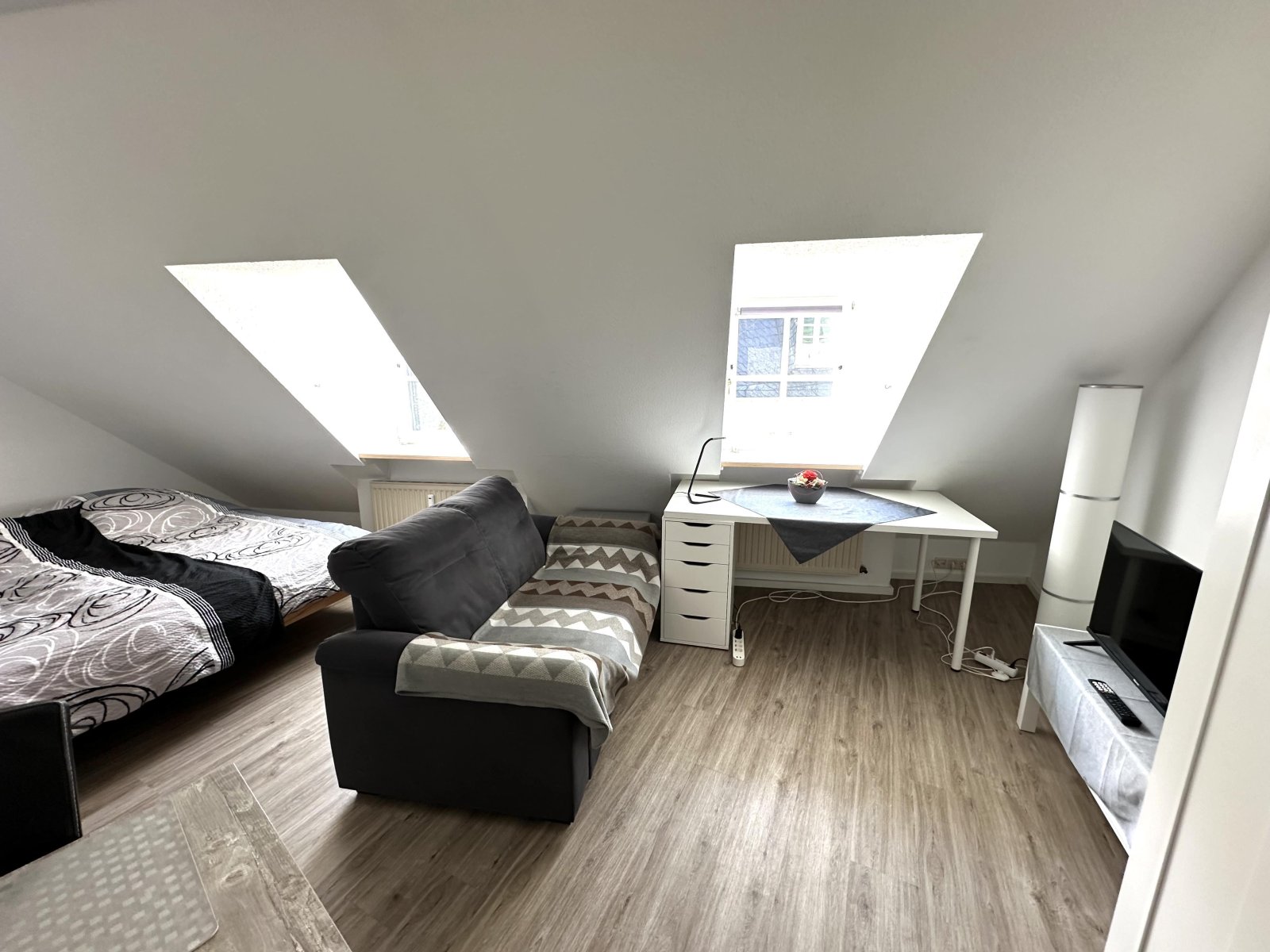 Lichtdurchflutetes Dachgeschoss-Apartment (2.OG) App.1