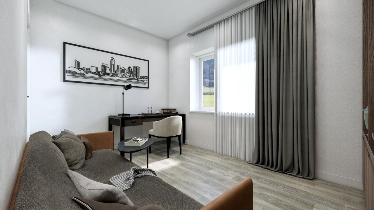 Helles Arbeitszimmer mit großflächigen Fenstern und flexiblem Raumkonzept